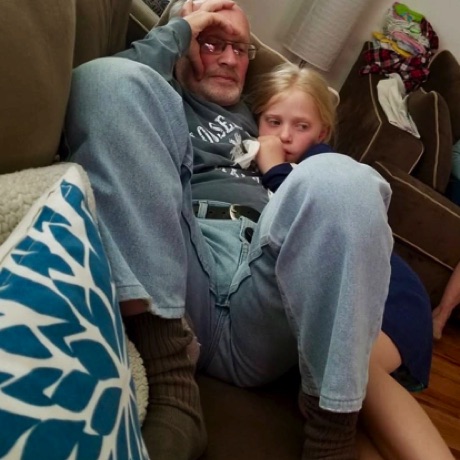 Snuggling with Grandpa