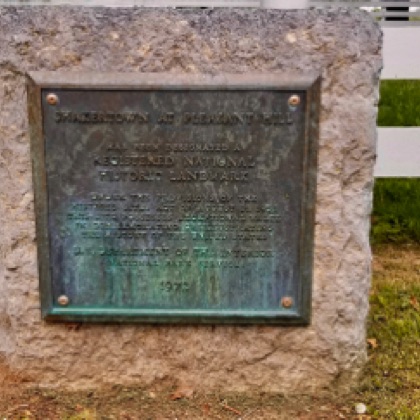 Plaque commemorating village as national historic site
